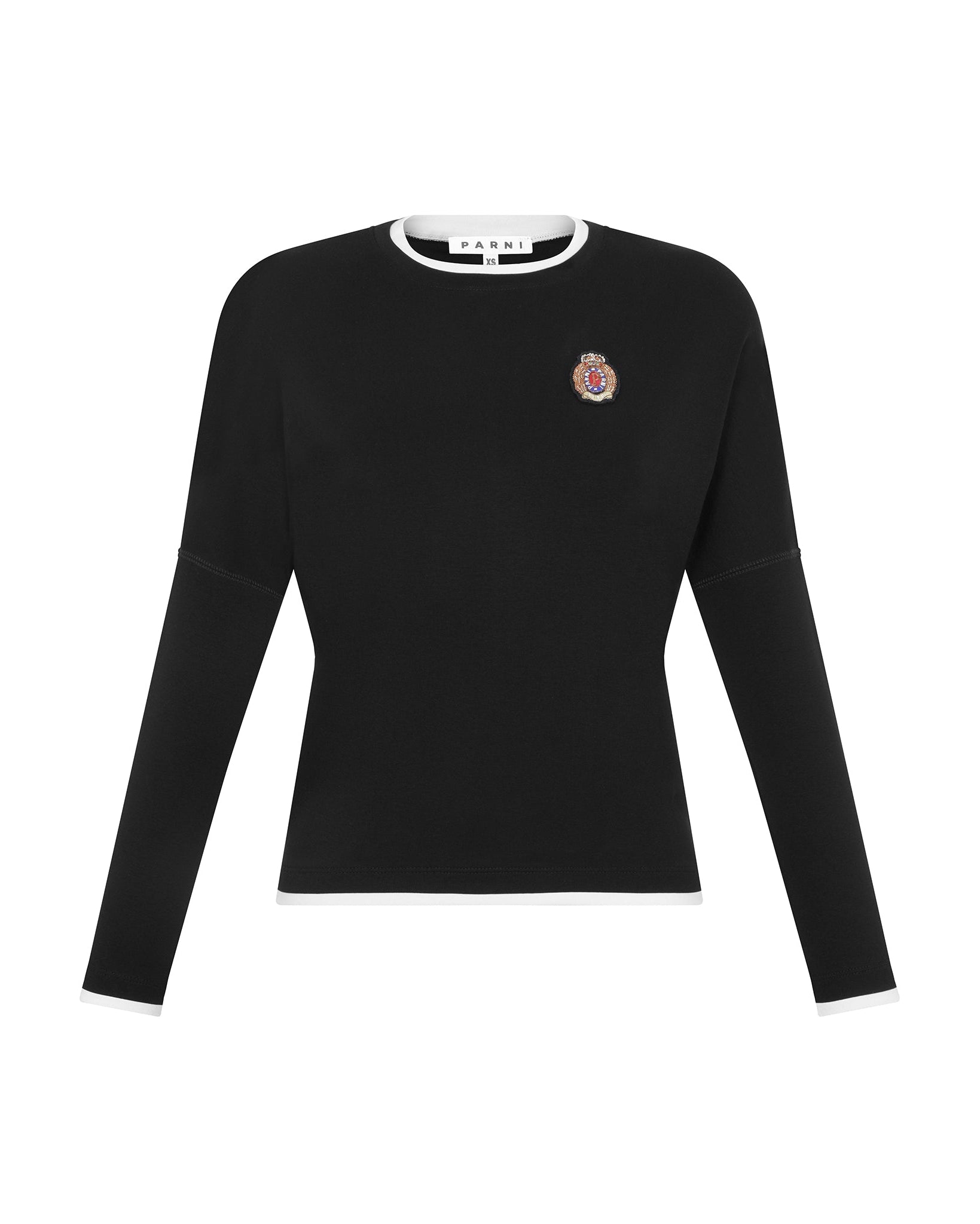 Black long-sleeve shirt with a small emblem on a white background