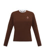 Brown Tshirt with a small emblem on a white background