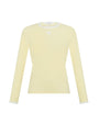 Light yellow long-sleeve top on a white background