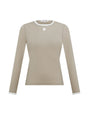Beige long-sleeve shirt with white trim on a white background