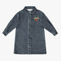 A washed dark gray denim dress with a button-down front, collar, and three-quarter sleeves, featuring a yellow and red 'Little Parni' patch on the left chest, shown against a plain white background.