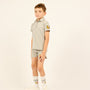 Boy wearing the grey LP Boys Varsity Short Sleeve Polo.