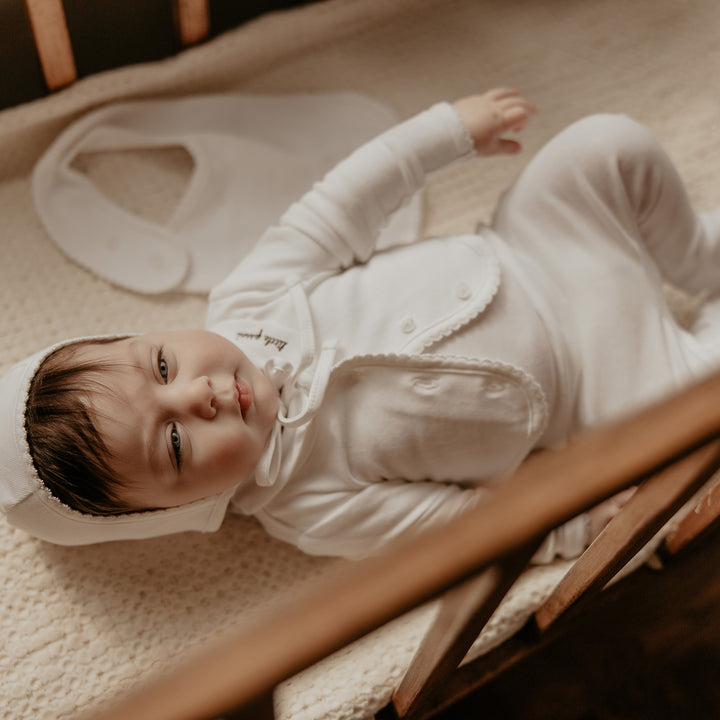 Baby wearing the LP 4-Piece Layette Set.