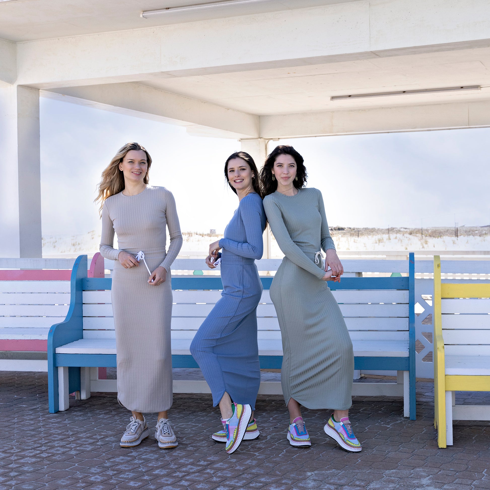 Models wearing Midi Tie Skirt in taupe, blue and green.