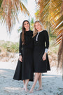 Model wearing the Cayman Skirt in black.